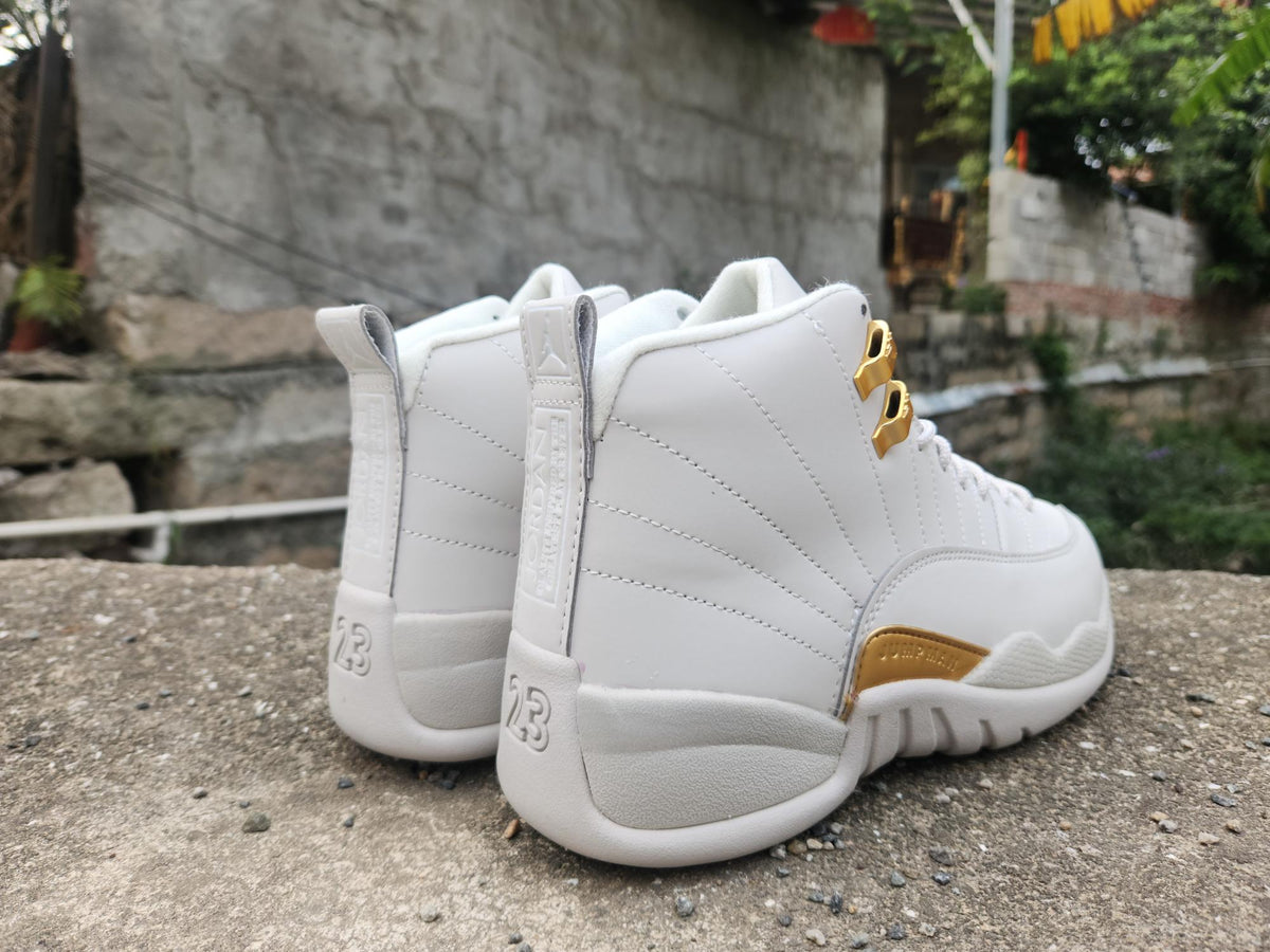 Air Jordan 12 Retro – Grey/Gold ("Taxi")